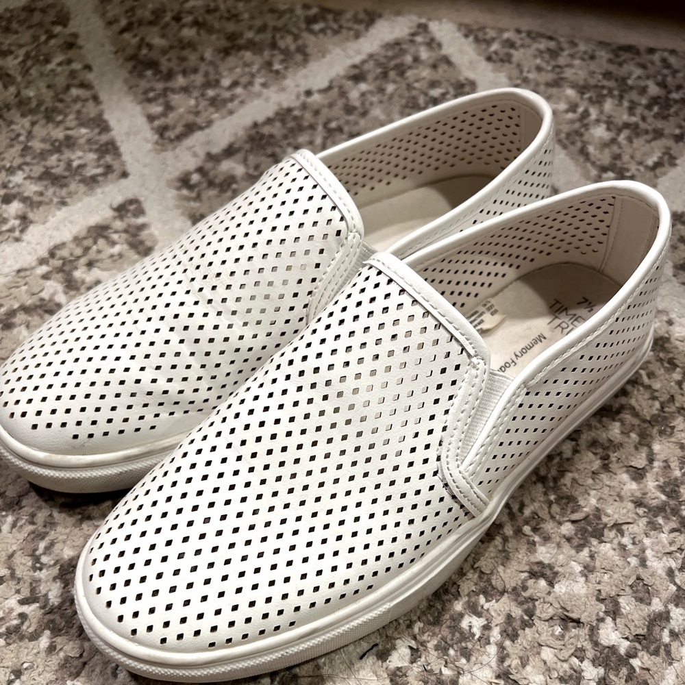 Lightly worn white slip on sneaker